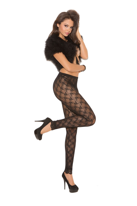 Woman wearing black sheer lace leggings, high waist and floral lace pattern, front view of legs