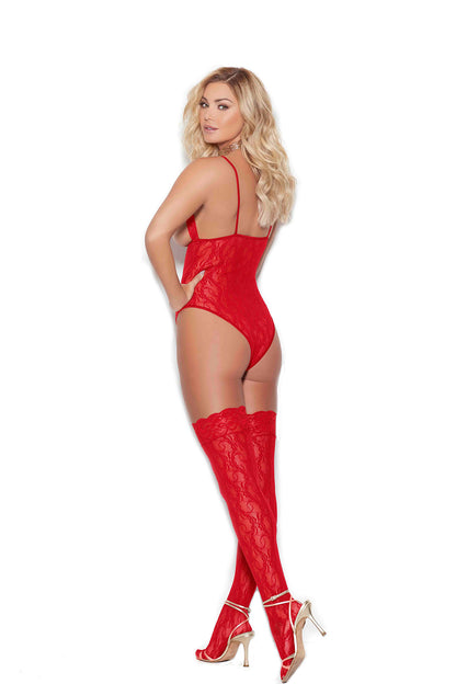 Woman wearing a red cupless lace teddy with lace-top thigh highs, open back and thong cut