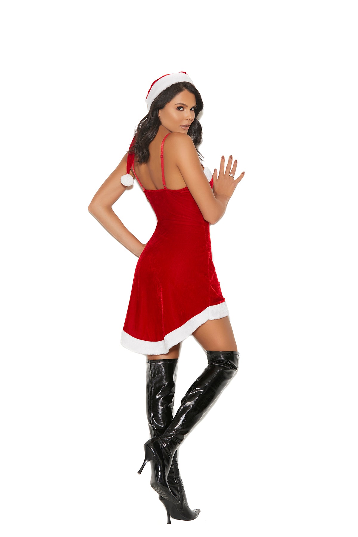 Woman wearing a red velvet mini dress, low back and mini hem, back view
